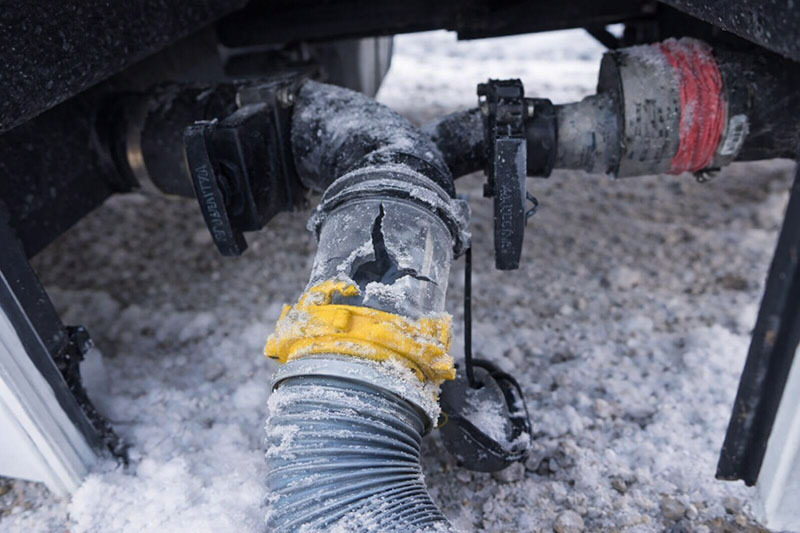 Frozen cracked RV sewer hose elbow connection